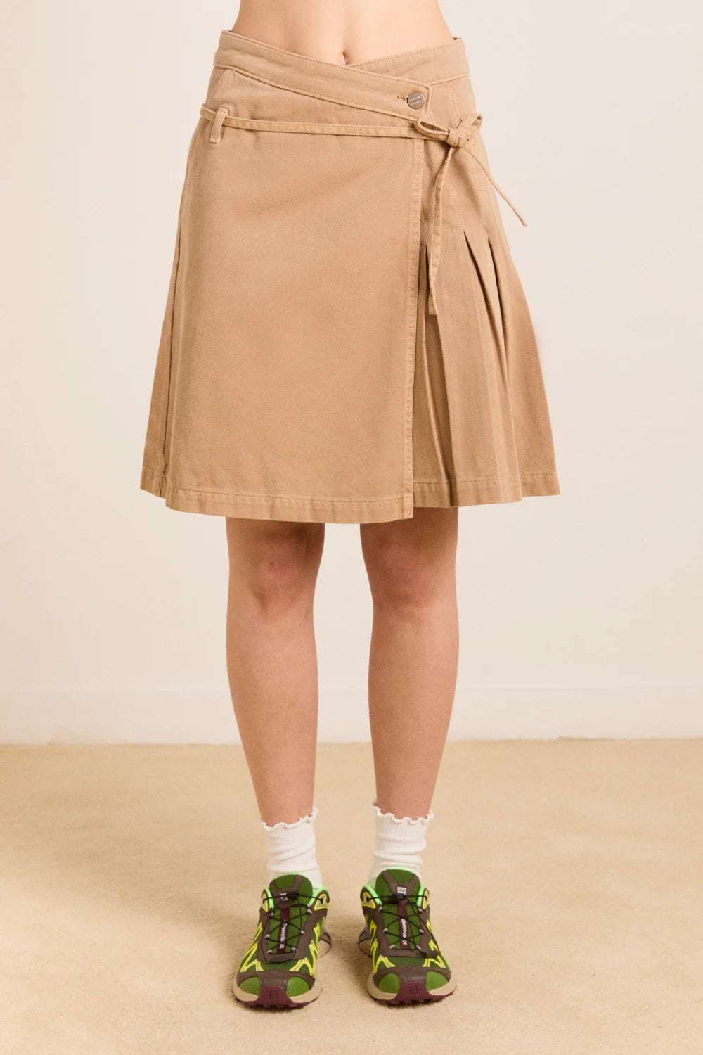Kat Kilt, Tan